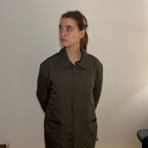 Luxury Cole Haan field jacket in olive green. Insulated and water resistant.